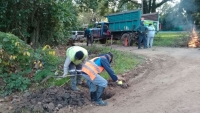 Limpieza de desagües pluviales en la calle Alsina