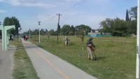 Espacio Público, corte de pasto sobre Ruta 40