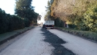 Colocación de piedras en la calle Canale del barrio Güemes