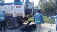 Trabajos de bacheo en el barrio Fonavi