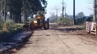 Nivelado de la calle San Martín, acceso a la Escuela Rural N°7