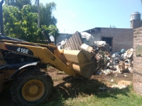 Limpieza de la propiedad de un vecino acumulador